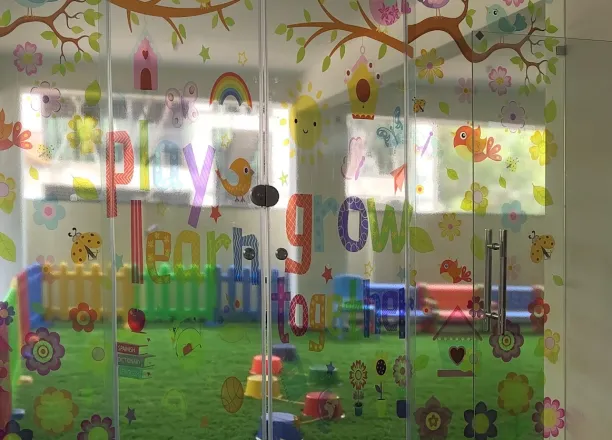 Glass-enclosed indoor play area at Cherubs' secure Kondapur campus